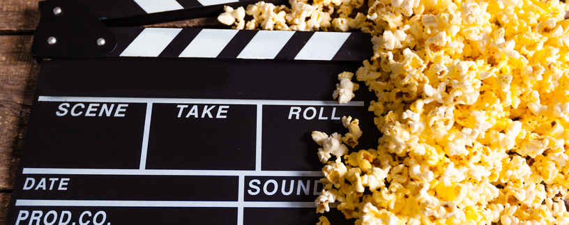 Filmklappe und Popcorn | © Envato